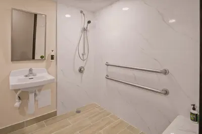 a bathroom with a shower and a sink at B&B Hotel Miami Airport in Miami