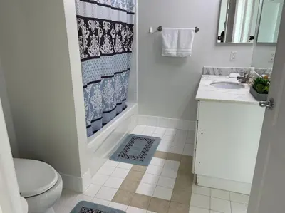 a bathroom with a toilet and a sink and a shower at Gorgeous apartment in Brickell in Miami
