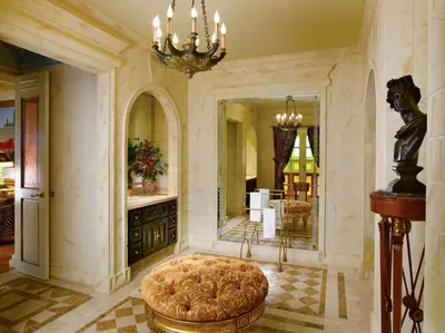 a large room with a large bed and a mirror at The Villa Casa Casuarina in Miami Beach