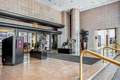a lobby with two statues of horses in a building at DoubleTree by Hilton Grand Hotel Biscayne Bay in Miami