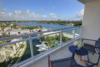 a balcony with a view of the water at Hilton Fort Lauderdale Marina in Fort Lauderdale