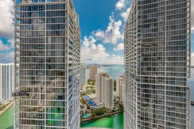a view of two tall buildings next to the water at Iconic Views in Miami