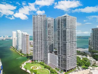 an aerial view of tall buildings next to the water at Marvelous apartment in Brickell in Miami