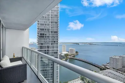 an apartment balcony with a view of the water at Marvelous apartment in Brickell in Miami