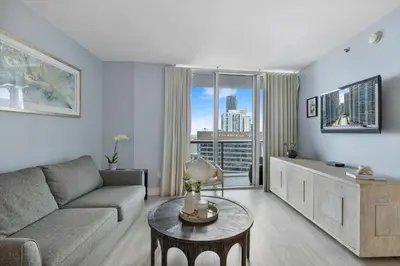 a living room with a couch and a table at Marvelous apartment in Brickell in Miami