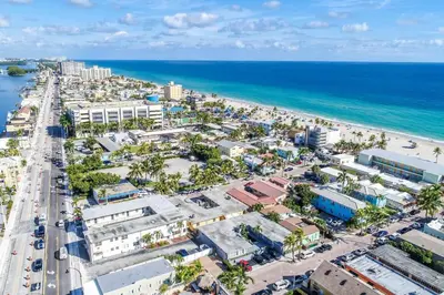 an aerial view of the beach and the ocean at Modern apartment wking bed beach views in Hollywood