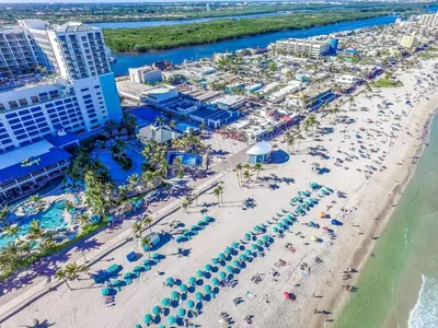an aerial view of a beach at a resort at Modern apartment wking bed beach views in Hollywood