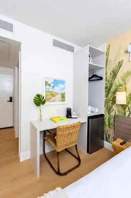 a white desk with a chair in a room at Casa Ocean in Miami Beach