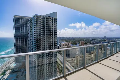 a view of the ocean from the balcony of a building at Private Ocean Condos at Hyde Beach Resort & Residences in Hollywood