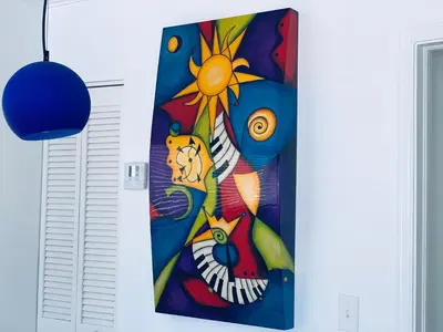 a painting on the side of a wall at Sunrise Penthouse ocean view terrace beach few steps away SOBE in Miami Beach
