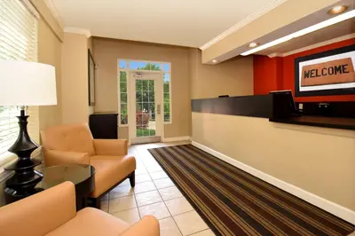 a lobby with a waiting room with a television at Extended Stay America Suites - Fort Lauderdale - Davie in Davie