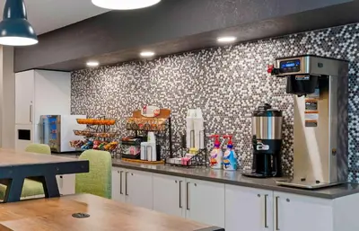 a kitchen with a counter with a coffee machine at Extended Stay America Premier Suites - Miami - Coral Gables in Miami
