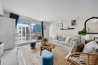 a living room with a couch and a table at Great 2 Bedrooms in Brickell in Miami
