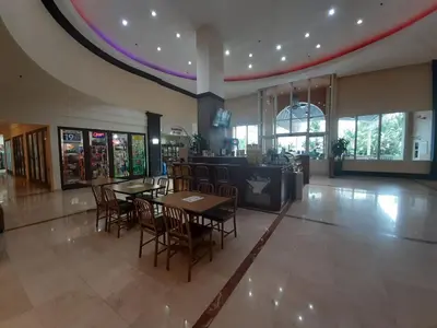 a dining room with tables and chairs in a building at Miami Direct Access to the beach in Miami Beach