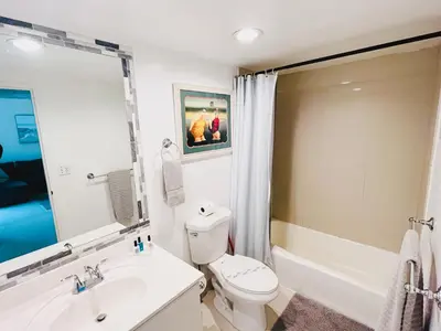 a bathroom with a toilet and a sink and a tub at Miami Hollywood Bay View on the Beach 002-1bvic in Hollywood