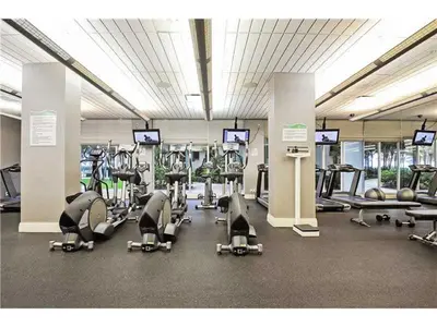 a gym with a lot of cardio equipment in it at Miami Hollywood Bay View on the Beach 002-1bvic in Hollywood