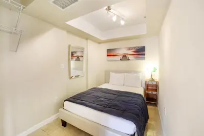 a bedroom with a bed in a room at Miami Downtown City view 3BR Air Hockey &Ping Pong table in Miami