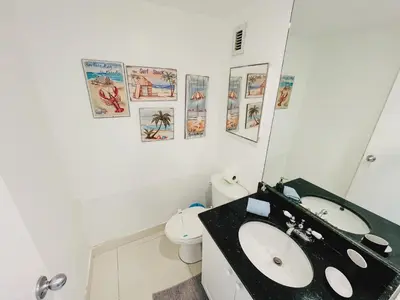 a bathroom with a black sink and a toilet at Excellent Hollywood 2BD Condo 0012-21mar in Hollywood