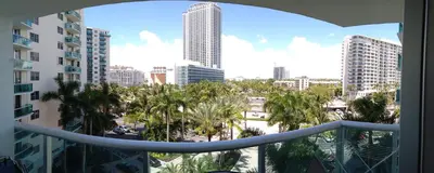 a view of a city with palm trees and buildings at Tides Apt on Hollywood Beach in Hollywood