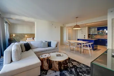a living room with a couch and a table at WVR Vacation Residences 506 in Fort Lauderdale