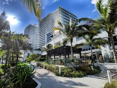 a view of a building with palm trees at WVR Vacation Residences 506 in Fort Lauderdale