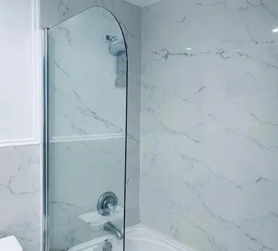 a bathroom with a shower with a glass door at SOBE OCEAN VIEW OCEAN DR charming studio -316 in Miami Beach