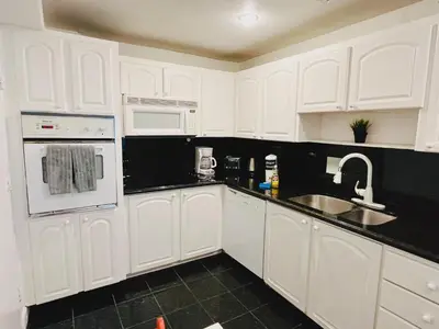 a white kitchen with white cabinets and a sink at Miami Hollywood Great 2BD Condo 009-21mar in Hollywood