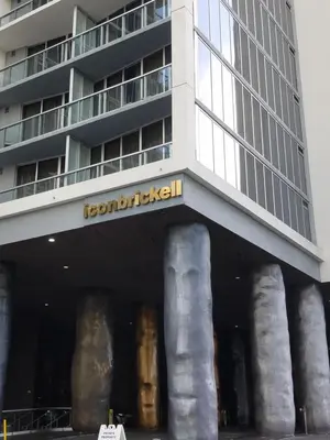 a building with columns in front of a building at Iconbrickell in Miami
