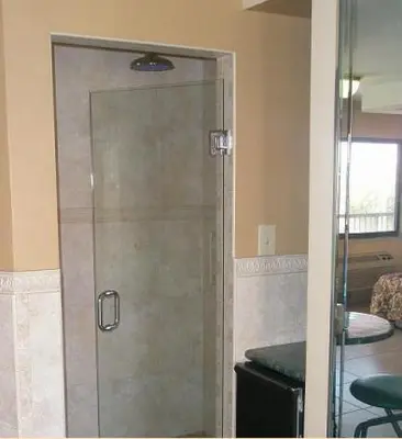 a shower with a glass door in a bathroom at Miami Princess Hotel in Miami
