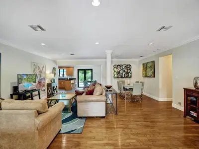 a living room with couches and a dining room at Vidal Manor in Fort Lauderdale