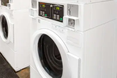 a white washer and dryer in a room at Knights Inn Hallandale in Hollywood