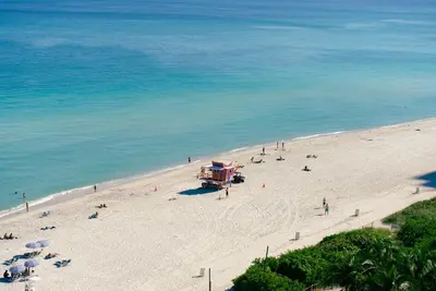an overhead view of a beach with people on it at Monte Carlo Miami Beach in Miami Beach