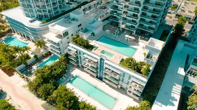 an overhead view of a building with two swimming pools at Monte Carlo Miami Beach in Miami Beach