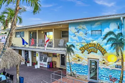 a building with a mural on the side of it at The Blue Wave in Hollywood