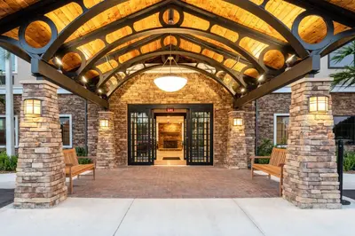 an entrance to a building with a wooden ceiling at Staybridge Suites - Fort Lauderdale Airport - West by IHG in Davie
