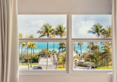 an open window with a view of the ocean at Lorraine Hotel in Miami Beach