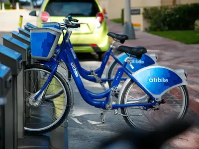 a blue bike parked next to a parking meter at Lorraine Hotel in Miami Beach
