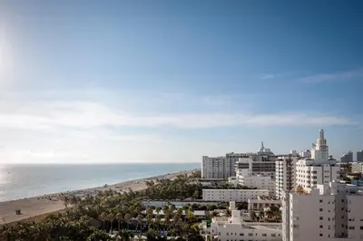 a view of a city and the beach at The Shelborne by Proper, a Member of Design Hotels in Miami Beach