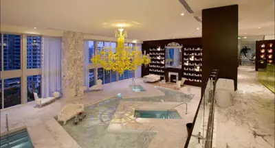 a large bathroom with a tub and a chandelier at Luxury 1 BR Condo W Icon Brickell-Waterviews in Miami