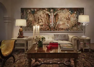 a living room with a couch and a table at Casa Faena Miami Beach in Miami Beach