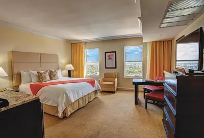 a hotel room with a bed and a desk at Sea View Hotel in Miami Beach