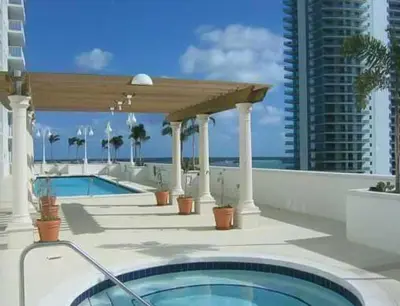 a swimming pool on the roof of a building at Top Stay Miami Blue Brickell in Miami