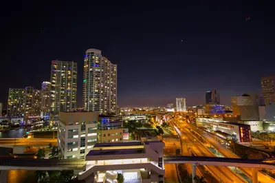 a city skyline at night with buildings and traffic at Comfort Inn & Suites Downtown Brickell-Port of Miami in Miami