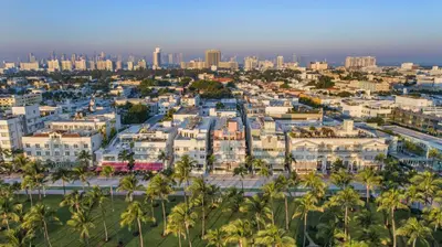 an aerial view of a city with palm trees at Hilton Vacation Club Crescent on South Beach Miami in Miami Beach