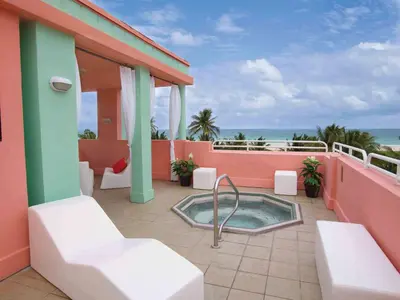a hot tub on the balcony of a resort at Hilton Vacation Club Crescent on South Beach Miami in Miami Beach