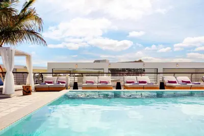 a pool on the roof of a hotel at Kimpton - Hotel Palomar South Beach by IHG in Miami Beach