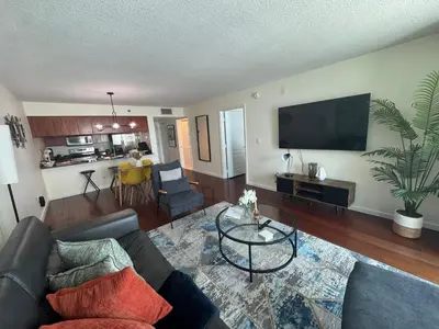 a living room with a couch and a table at Fabulous apartment in Brickell in Miami