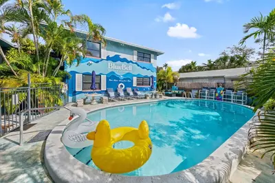 a swimming pool with a rubber duck in the middle at Blue Bell Apartment Hotel in Fort Lauderdale