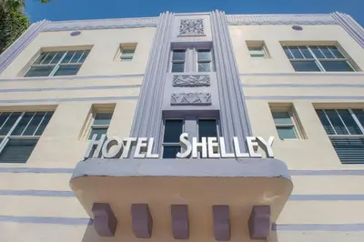 a hotel shleyley sign in front of a building at Shelley Hotel in Miami Beach