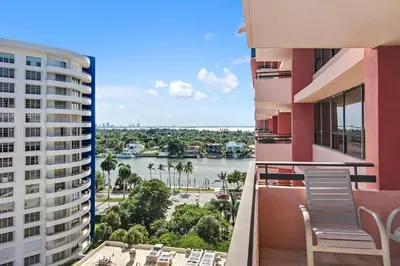 a balcony with a view of the water from a building at Alexander 1209 Beachfront condo with 2 pools , beach access, sauna, stores in Miami Beach